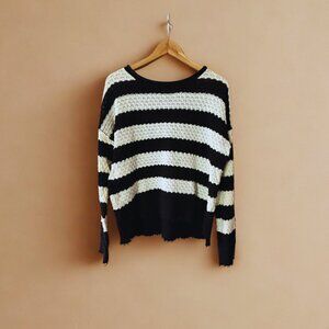 Black and white women’s sweater by Poet & Thread